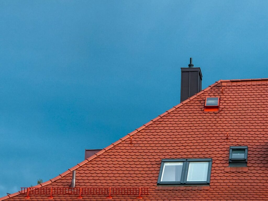 Tiled roof photograph used in an illustrative roofing website concept